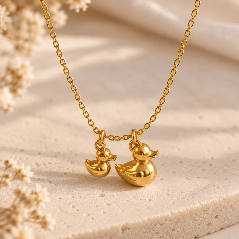 Colgante Mamá pato y sus patitos Acero DORADO