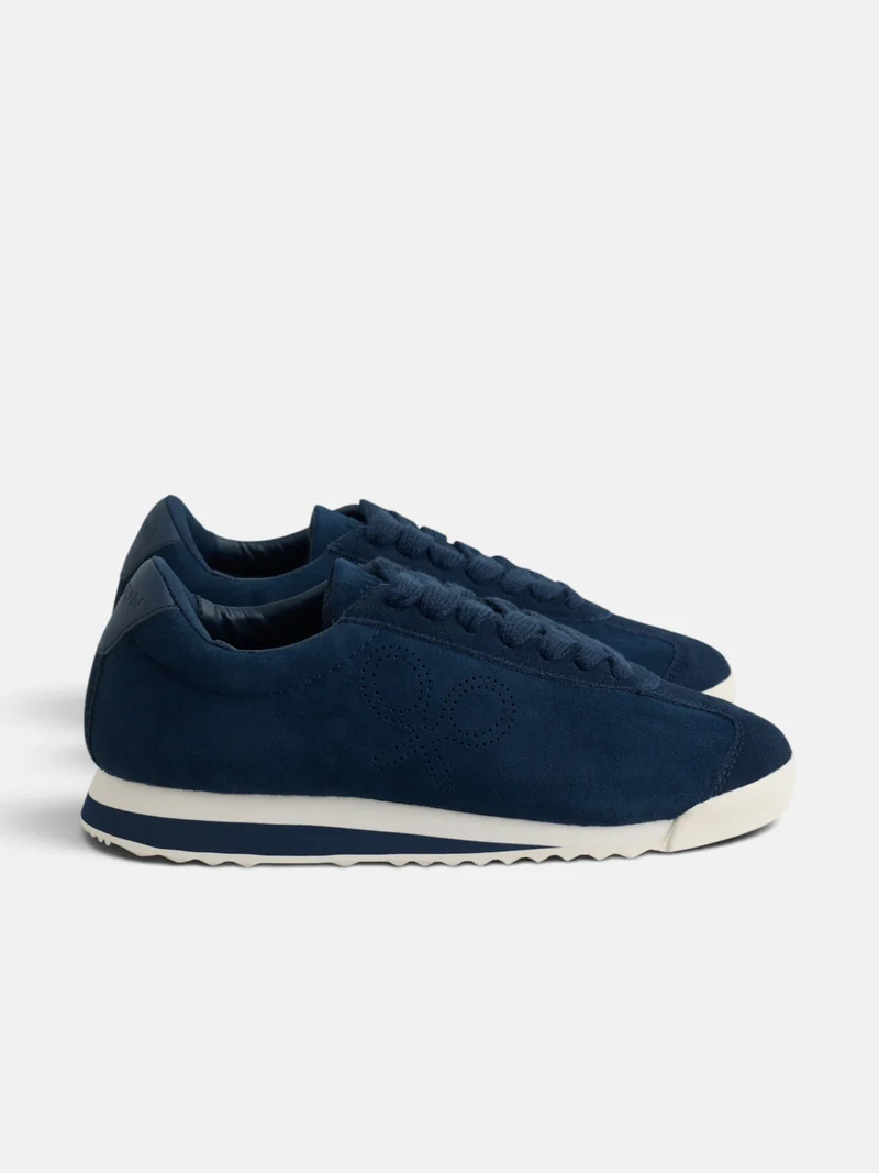 Zapatilla serraje logo perforado azul marino