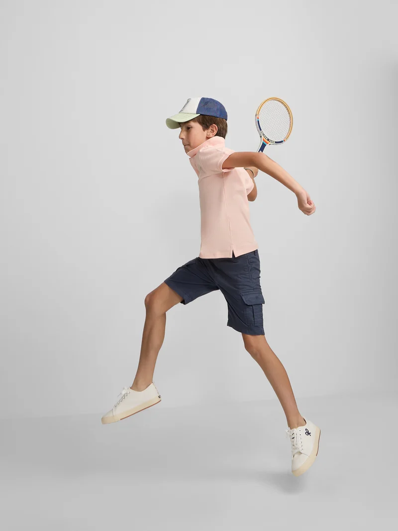 Polo kids liso logo rizo coral