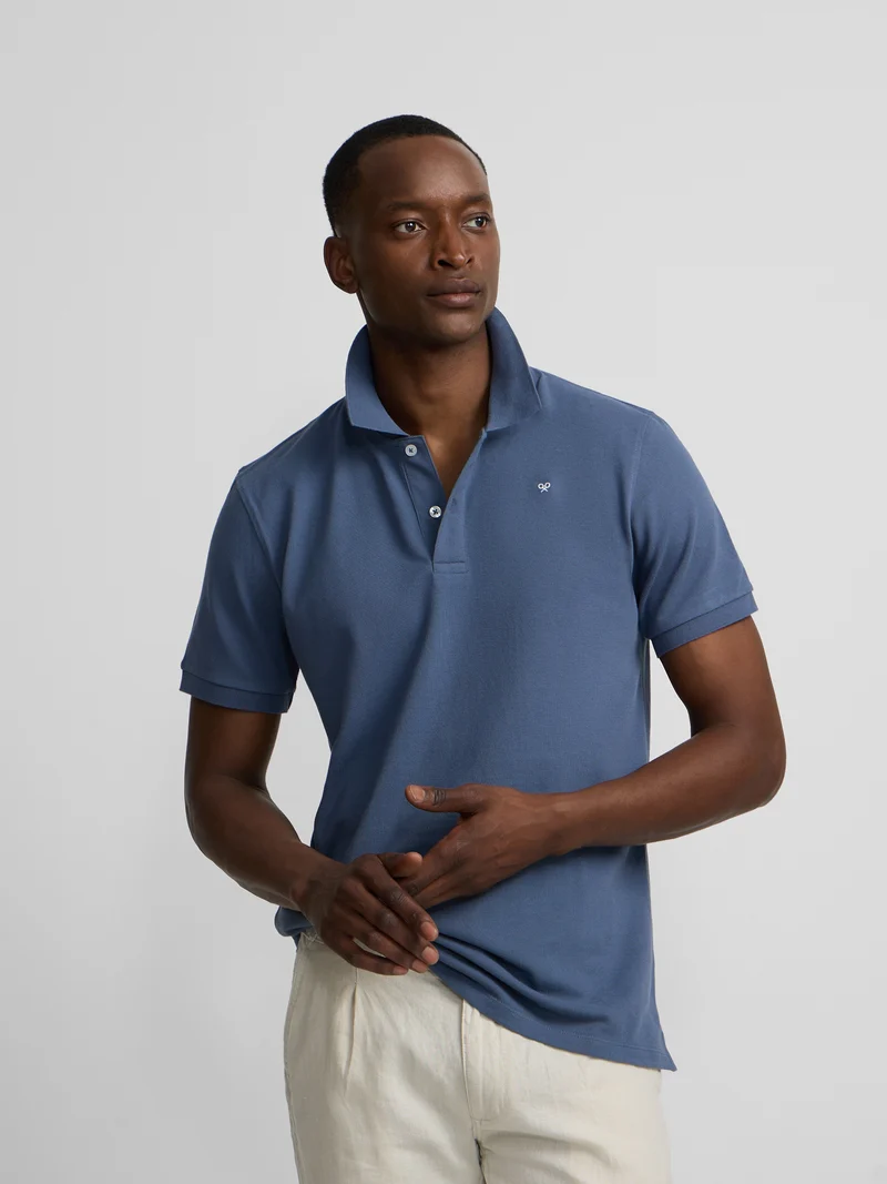Polo clasico liso azul indigo