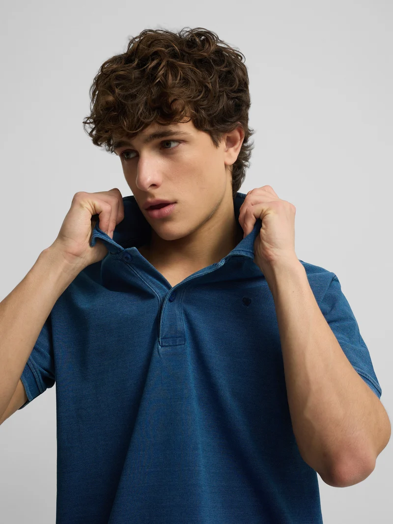 Polo manga corta style denim azul claro