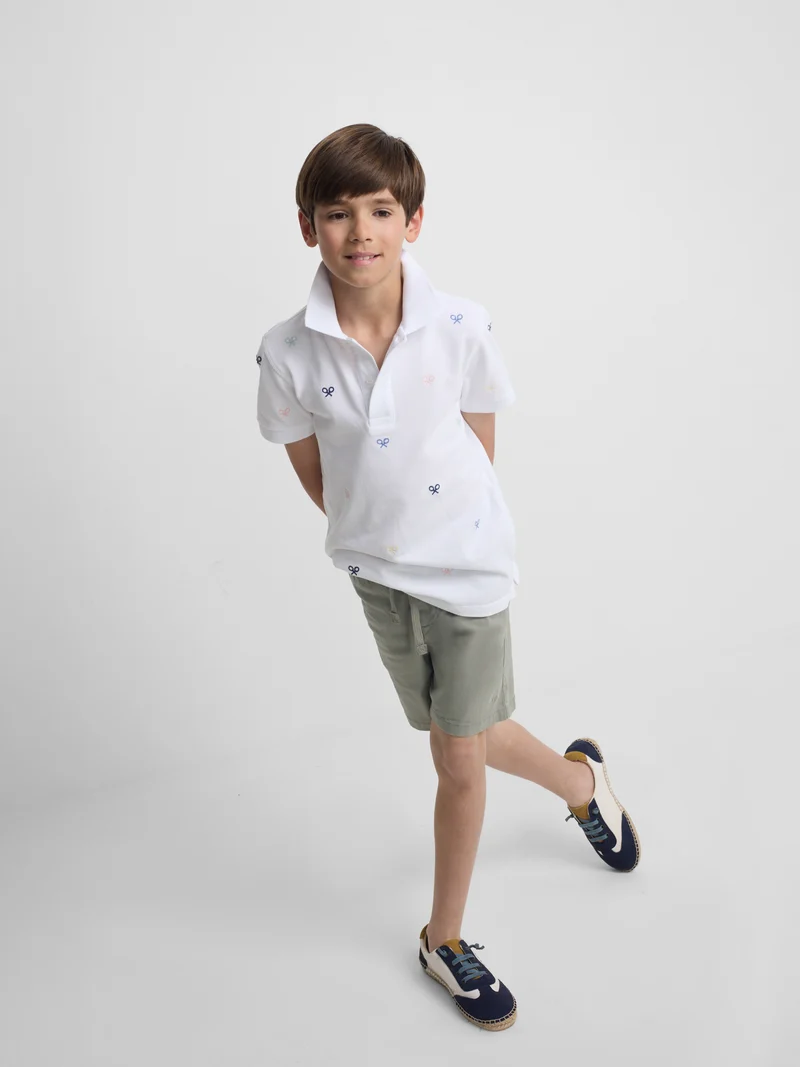 Polo kids multiraqueta colores blanco