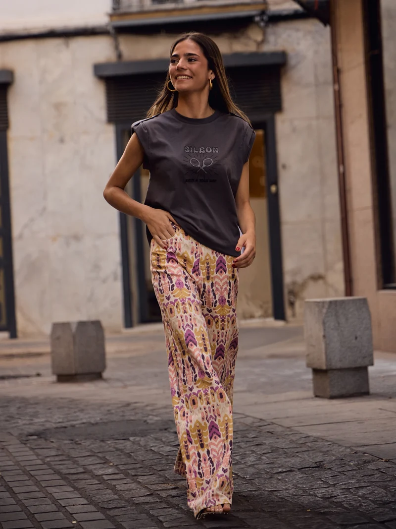Pantalon denim estampado ikat rosas