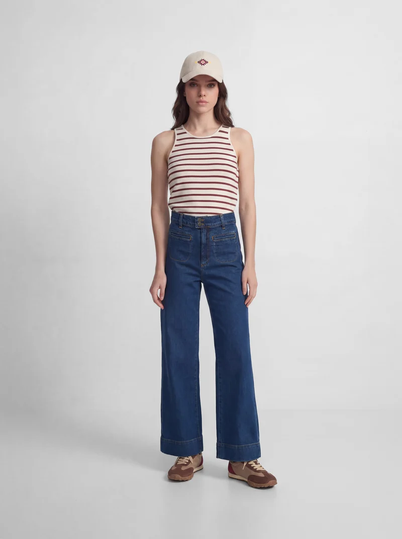 Pantalon denim flare bolsillos